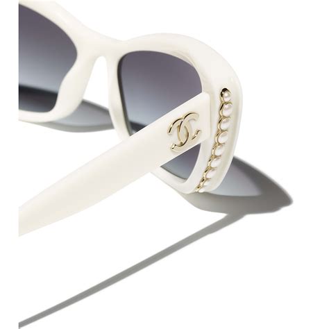 how much are chanel sunglasses|Chanel sunglasses with white trim.